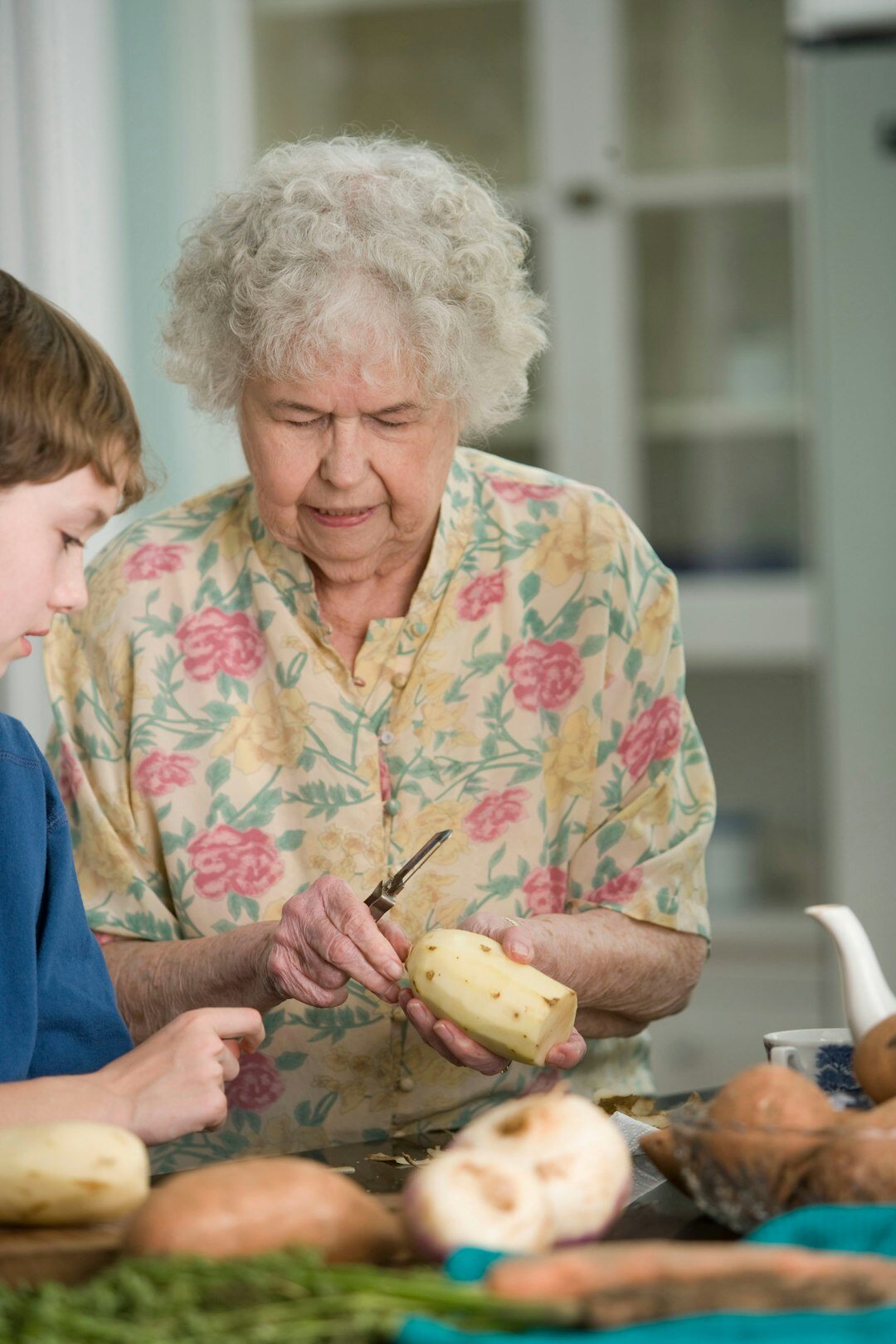 elderly woman helping neighbors
