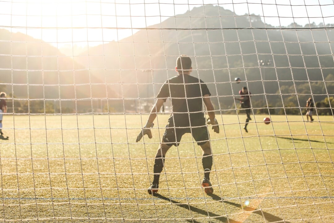 teenagers playing soccer